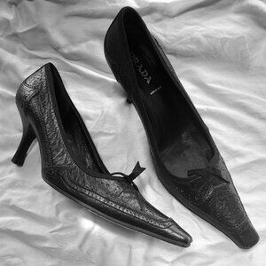 Prada Brogue black leather pointed toe pumps, fabric & leather bow